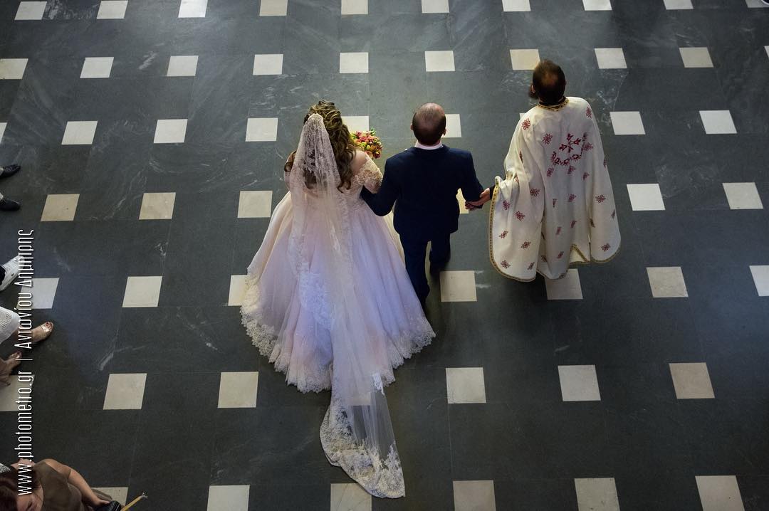 Bride and groom walking down the aisle, aerial view
